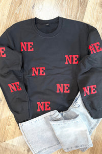NE All Over Red Puff Sweatshirt